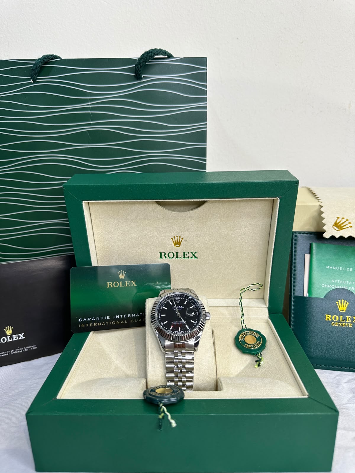 Rolex Noire avec packaging complet